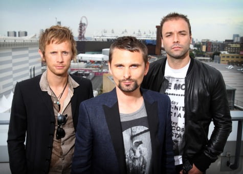 Today as part of One Month to go at the Main Press Centre on the Olympic Park, Straford, Muse (L/R Matt Bellamy, Dominic Howard and Chris Wolstenholme),one of the biggest bands in the UK/Europe, today annouced they will be releasing a thrie track 'Survival' which has been written for the Games and will be played at various sport sessions.